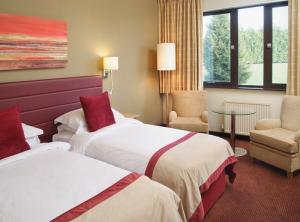 The Bedrooms at Stratford Manor - QHotels