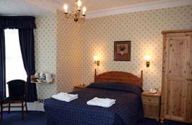 The Bedrooms at Royal Sportsman Hotel