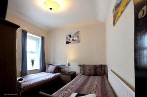 The Bedrooms at Leonardos Guest House