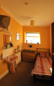 The Bedrooms at Leonardos Guest House