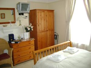 The Bedrooms at The Malvern Guesthouse and The Blues Grill