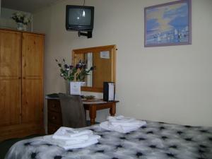 The Bedrooms at The Malvern Guesthouse and The Blues Grill