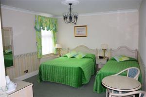 The Bedrooms at Camelia Hotel