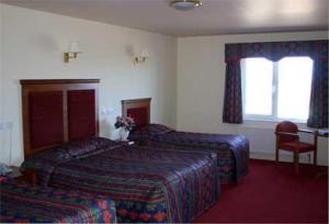 The Bedrooms at Inn On The Coast