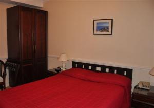 The Bedrooms at Camelia Hotel