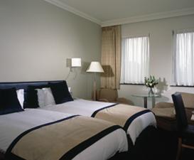 The Bedrooms at Stratford Manor - QHotels