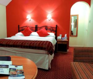 The Bedrooms at Best Western Falstaff Hotel