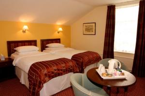 The Bedrooms at Best Western Falstaff Hotel