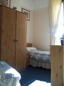 The Bedrooms at The Malvern Guesthouse and The Blues Grill