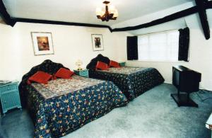 The Bedrooms at Barton Cross Hotel