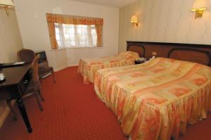 The Bedrooms at Wild Pheasant Hotel and Spa