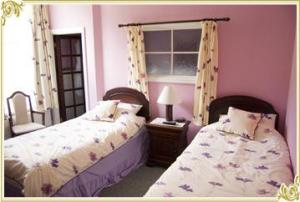 The Bedrooms at Buckley Pines Hotel
