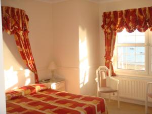 The Bedrooms at Camelia Hotel
