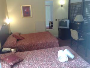 The Bedrooms at Churchills Hotel