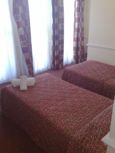 The Bedrooms at Churchills Hotel