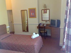 The Bedrooms at Churchills Hotel