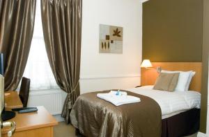 The Bedrooms at Grand St Leger Hotel