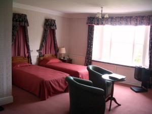 The Bedrooms at Rumwell Manor Hotel