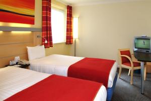 The Bedrooms at Express By Holiday Inn Earls Court