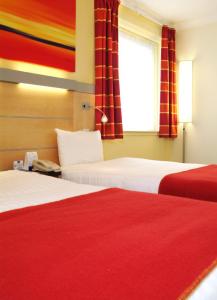 The Bedrooms at Express By Holiday Inn Earls Court