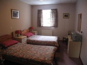 The Bedrooms at Fairburn Lodge