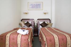 The Bedrooms at Astor Court Hotel