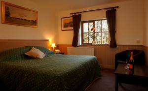The Bedrooms at Blazing Donkey Country Hotel
