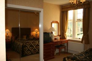 The Bedrooms at Dumbleton Hall Hotel