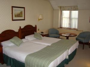 The Bedrooms at Old Tollgate Restaurant And Hotel