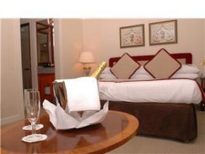 The Bedrooms at Park Lane Mews Hotel