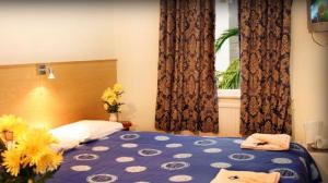 The Bedrooms at Arriva Hotel