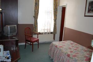 The Bedrooms at The New Ambassador Hotel