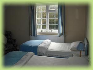 The Bedrooms at Airport Lodge - London STANSTED Airport (formerly Woodlands Lodge)