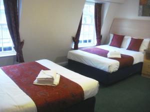 The Bedrooms at Comfort Inn And Suites Kings Cross St. Pancras