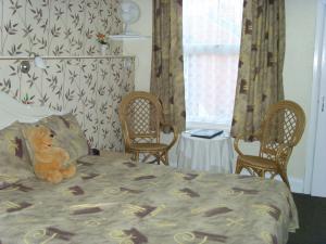 The Bedrooms at Sandy Acres Guest House