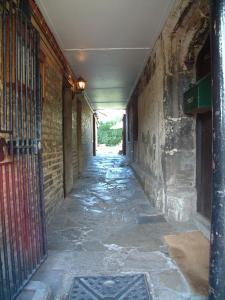 The Bedrooms at The Old Mill Hotel And 12th Century Restaurant