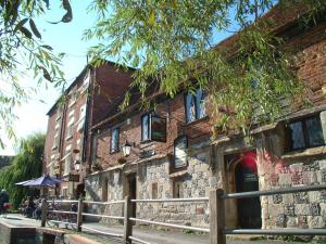 The Bedrooms at The Old Mill Hotel And 12th Century Restaurant