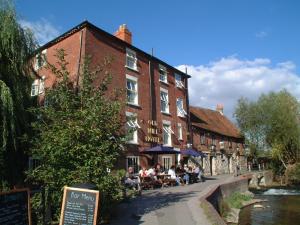 The Bedrooms at The Old Mill Hotel And 12th Century Restaurant