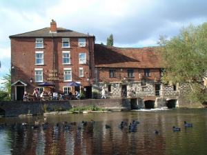 The Bedrooms at The Old Mill Hotel And 12th Century Restaurant