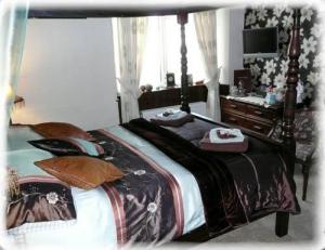 The Bedrooms at Rosebud Cottage Guest House