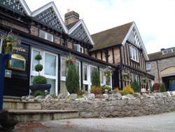 The Bedrooms at Peveril Of The Peak Hotel