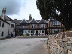 The Bedrooms at Peveril Of The Peak Hotel