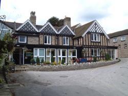 The Bedrooms at Peveril Of The Peak Hotel