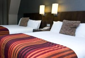 The Bedrooms at Crowne Plaza London Kensington