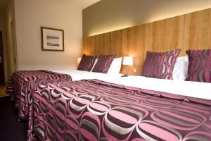 The Bedrooms at Apex International Hotel