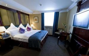 The Bedrooms at Best Western Shaftesbury Paddington Court Suites