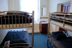 The Bedrooms at The Nightingale Lodge