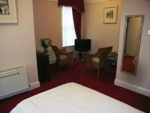 The Bedrooms at Rosscourt Hotel - Guest House