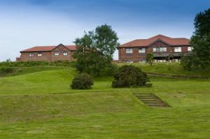 The Bedrooms at Hunley Hotel and Golf Club