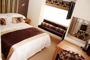 The Bedrooms at Ennios Boutique Hotel